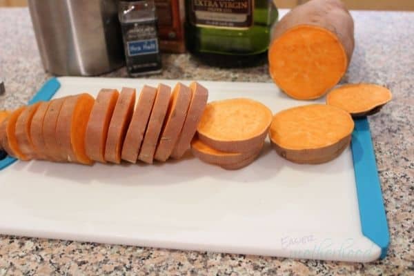 sliced sweet potato rounds with remaining ingredients in the background