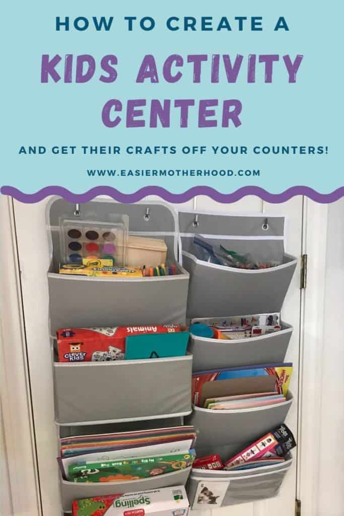 Pin image with text on top that reads "how to create a kids activity center and get their crafts off your counters" with image below text of two wall hanging storage solutions hung on a pantry door, containing toddler craft supplies and puzzle like activities.